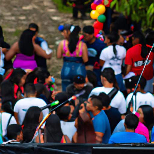Passionate fans enjoying live performances at a Radio Galaxia La Picosa de Guatemala event.