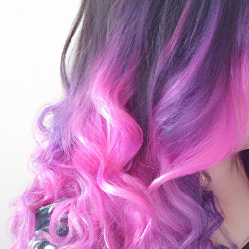 Unleash your inner galactic goddess with this galaxy pink and purple hair transformation, a stunning combination of cosmic colors that will leave everyone in awe.