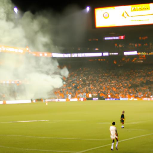 Fans passionately cheering for their respective teams as Houston Dynamo takes on LA Galaxy in a thrilling match.