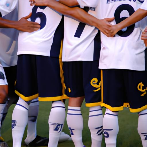 LA Galaxy players discussing their strategy and lineup before the game.