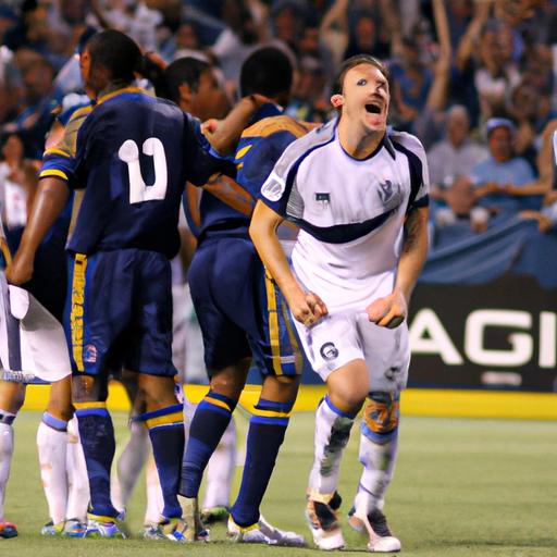 The LA Galaxy's forward celebrates in jubilation after scoring a crucial goal that puts his team in the lead.
