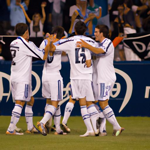 Whitecaps' celebration after scoring against LA Galaxy in a crucial match.